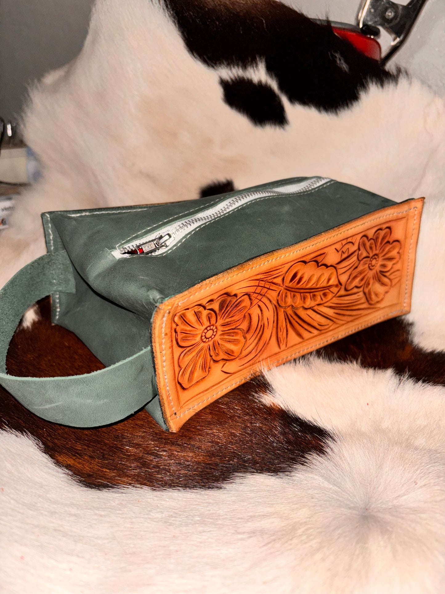 Tooled zipper pouch