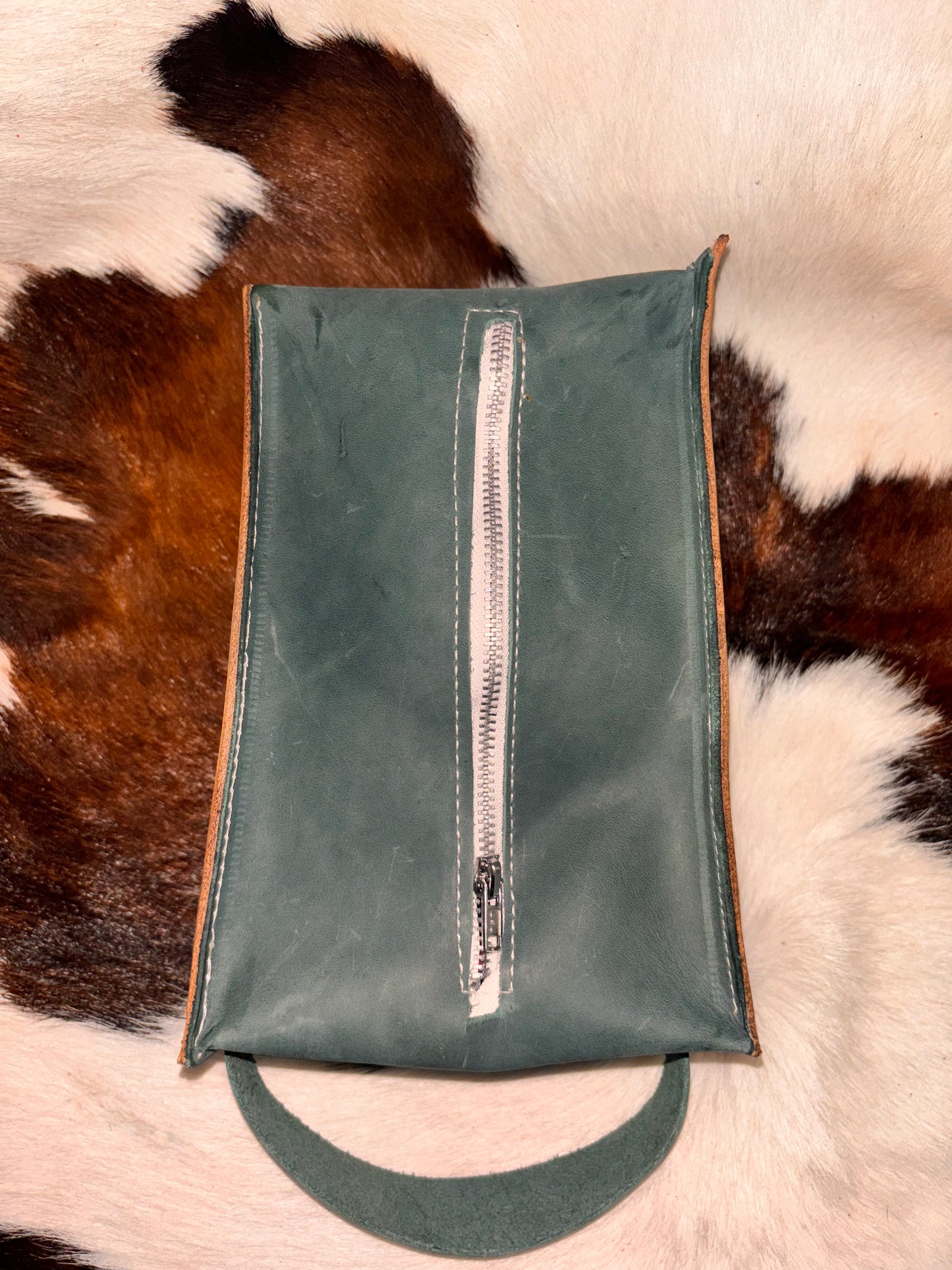Tooled zipper pouch