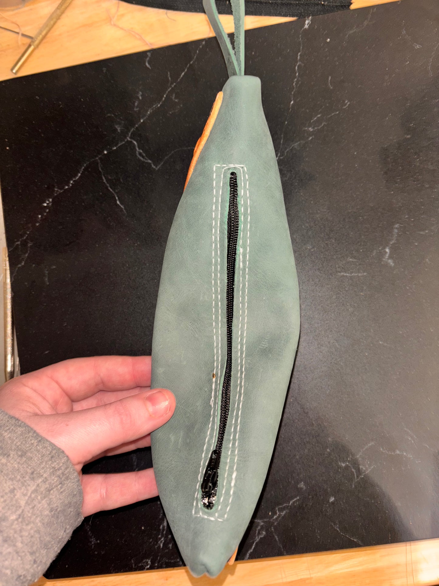 Tooled pouch
