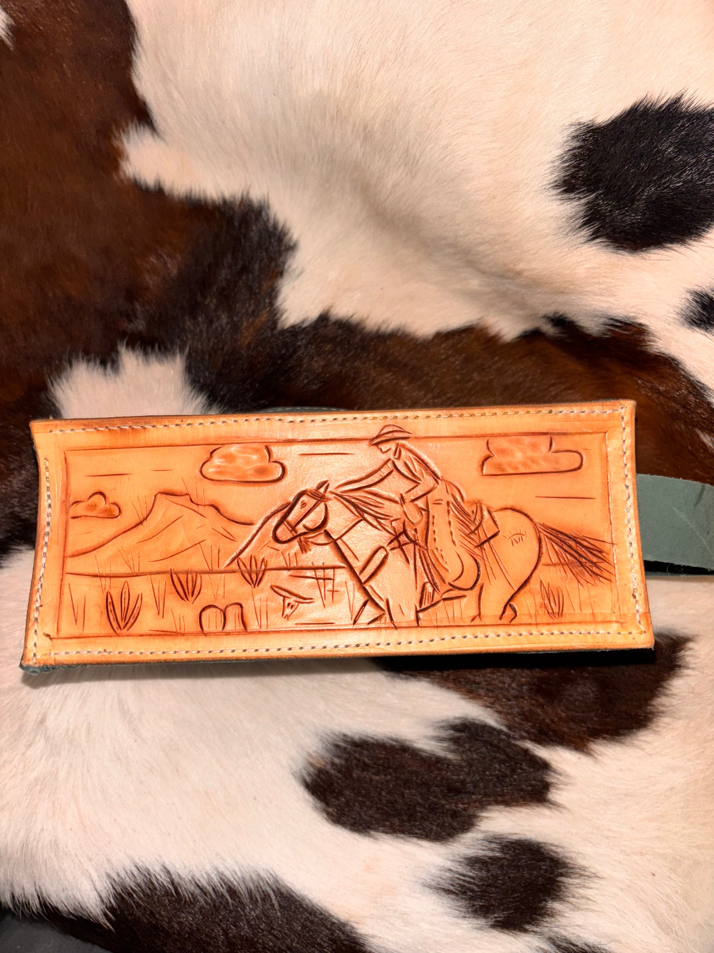 Tooled zipper pouch