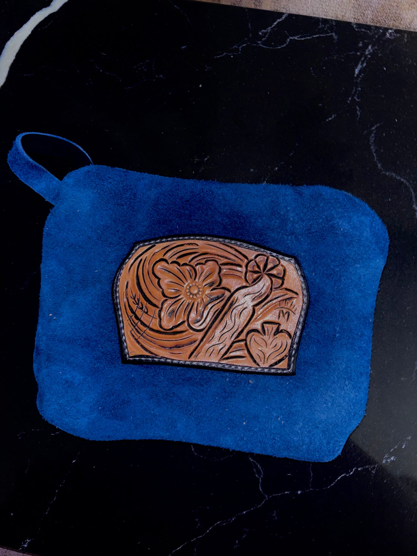 Tooled leather pouch