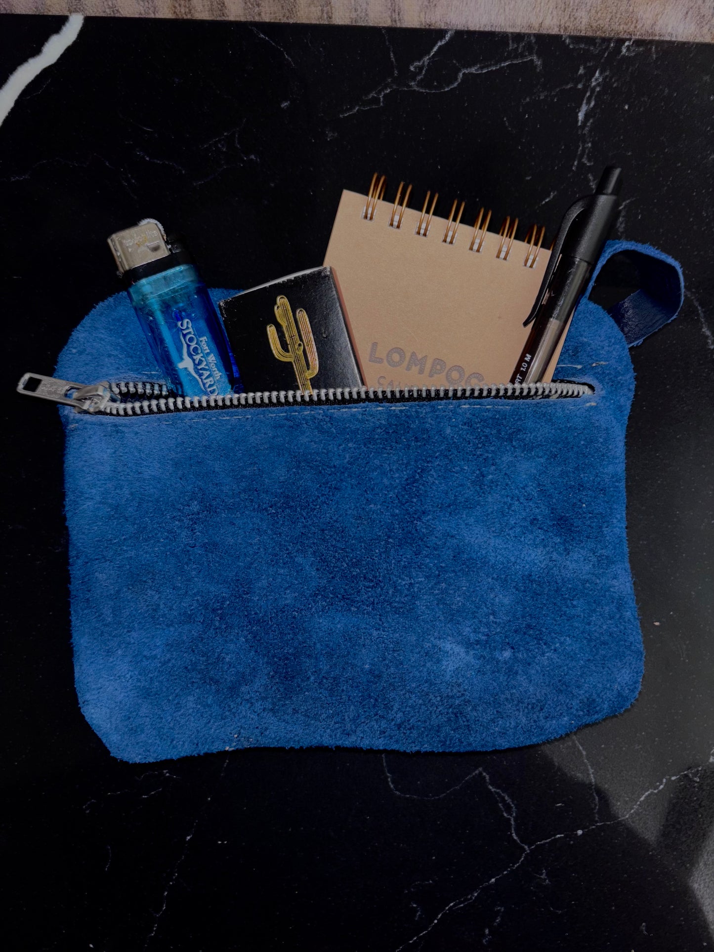 Tooled leather pouch