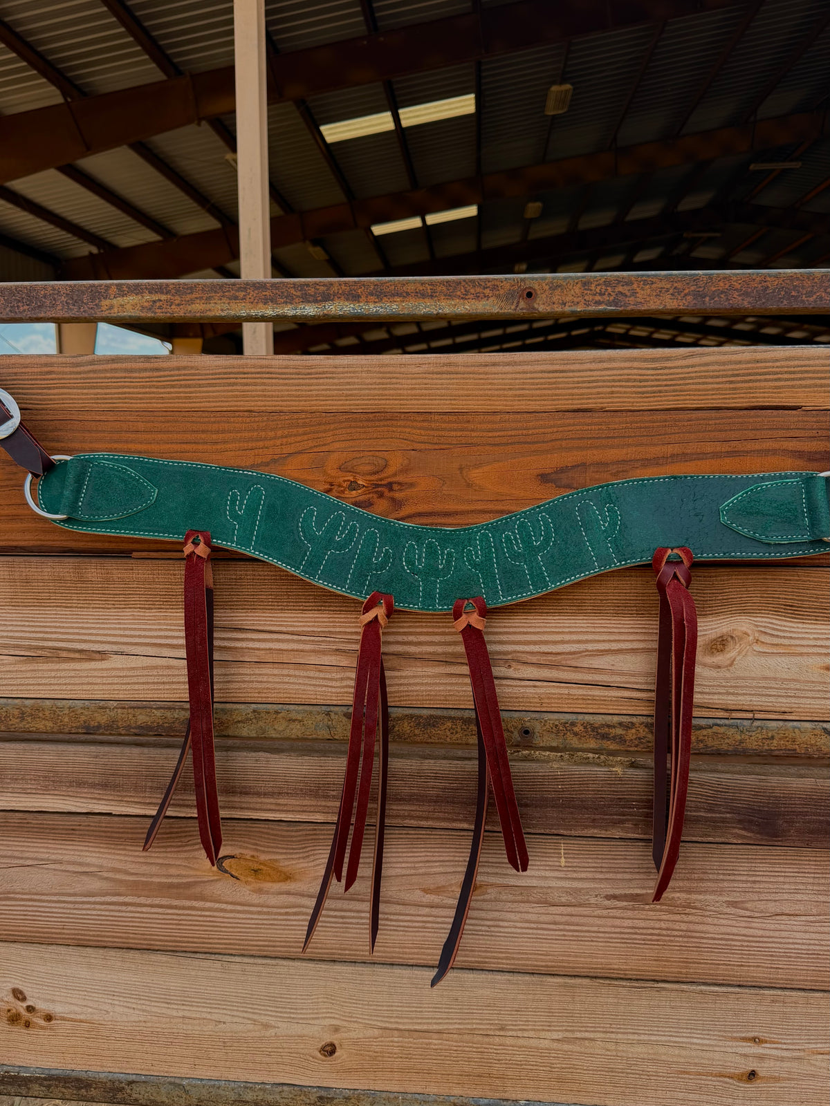 Green stitched tripping collar