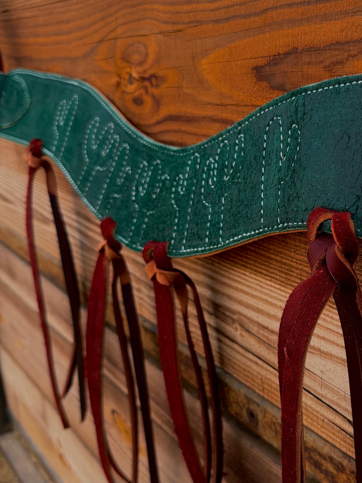 Green stitched tripping collar