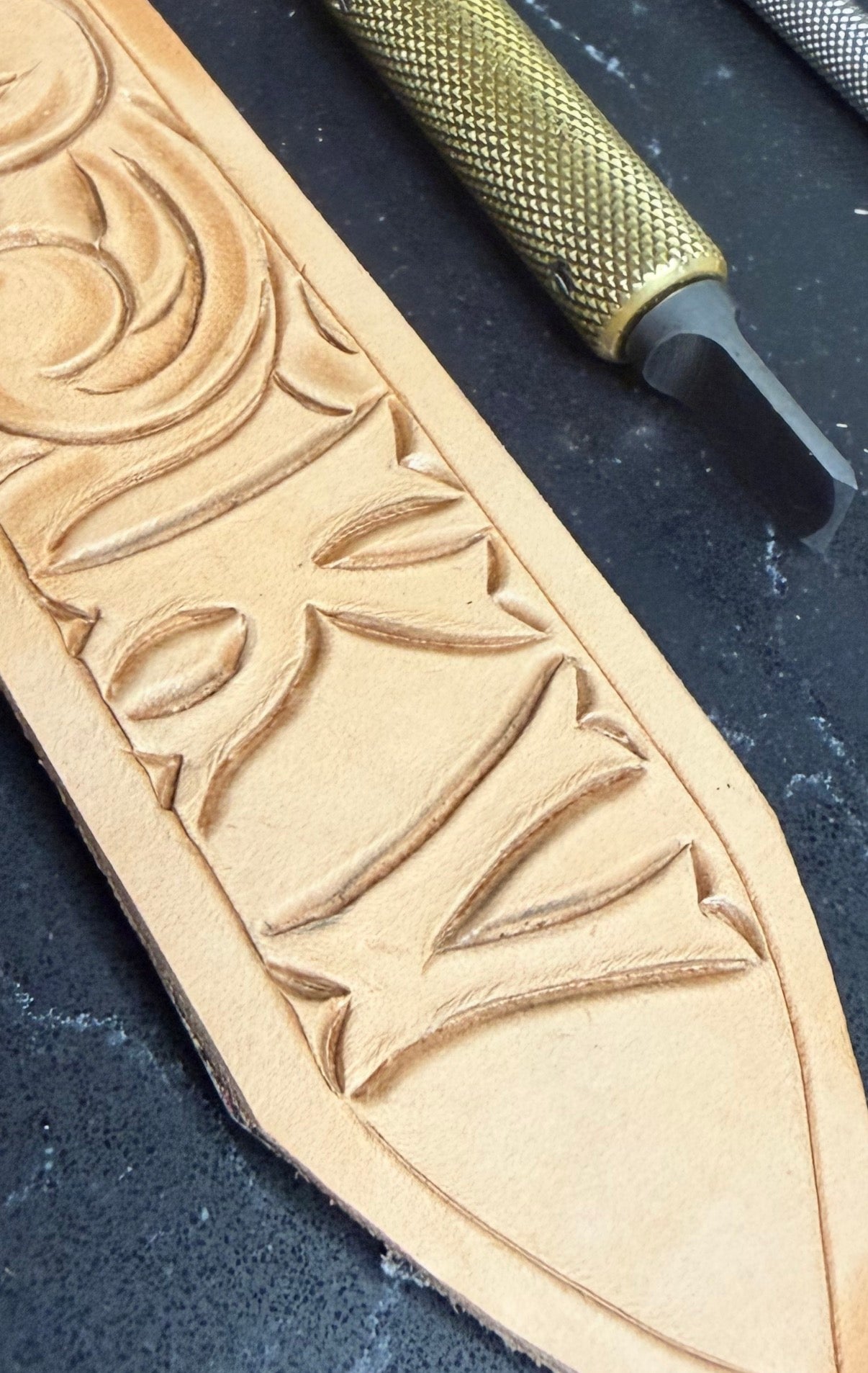 Tooled belt end